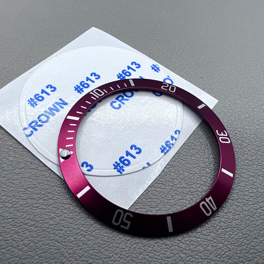 38mm green luminous ceramic watch bezel with red ring and silver font for precision repair.
