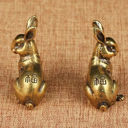 Pair of vintage solid copper rabbit figurines, hand-carved bronze trinkets for decor.
