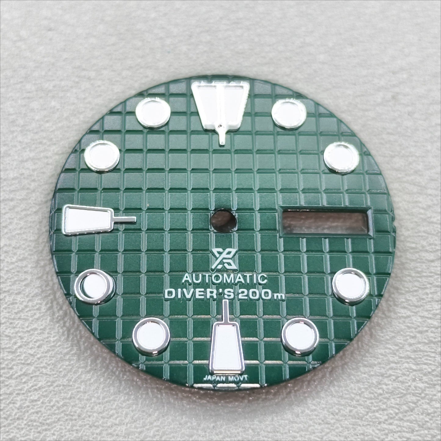 watch dial with S logo