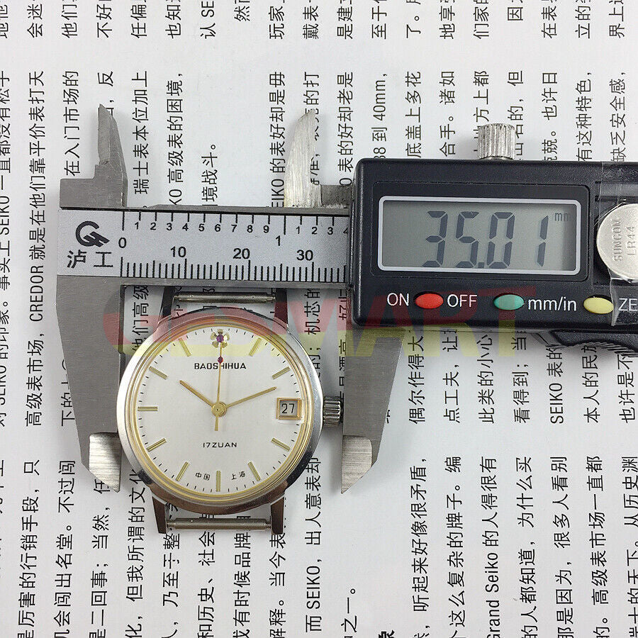 33mm Shanghai manual mechanical watch with single calendar, 17 jewels, shock-resistant design for classic daily wear.