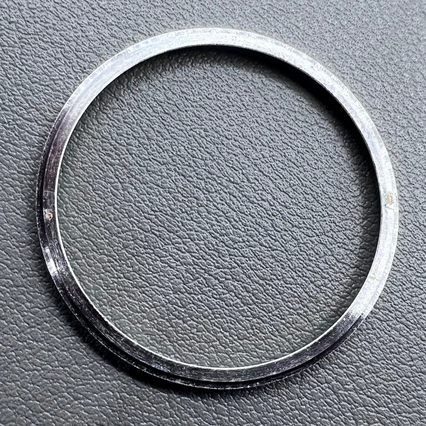 Golden stainless steel chapter ring for watches, 34.9x31.0x1.9mm, durable accessory.