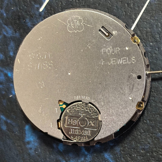 Swiss ETA G10.711 quartz watch movement with 6 hands, date at 4, for precise timekeeping.