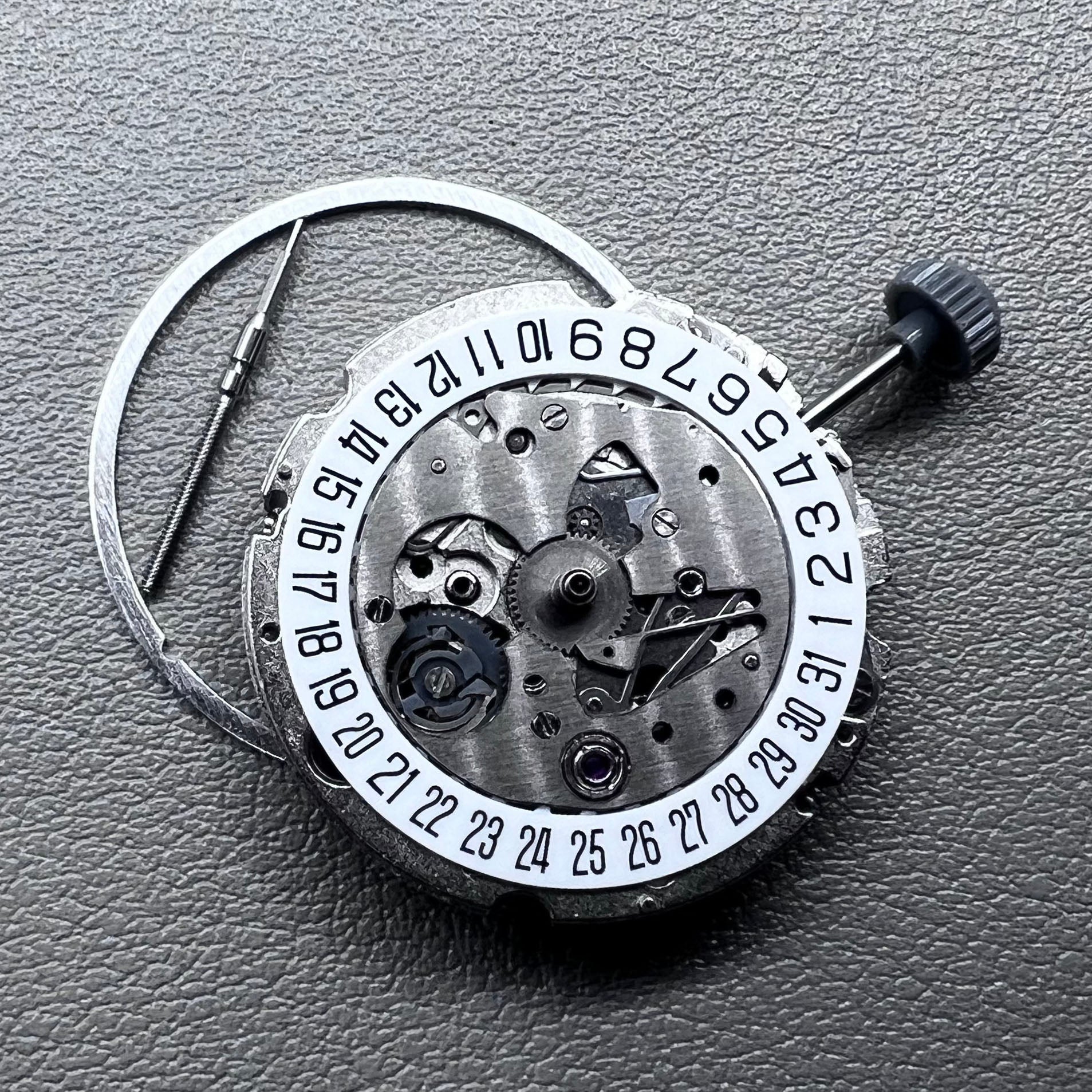 Miyota 8200 watch movement with single calendar date at 6 o'clock, precise Japanese mechanism.