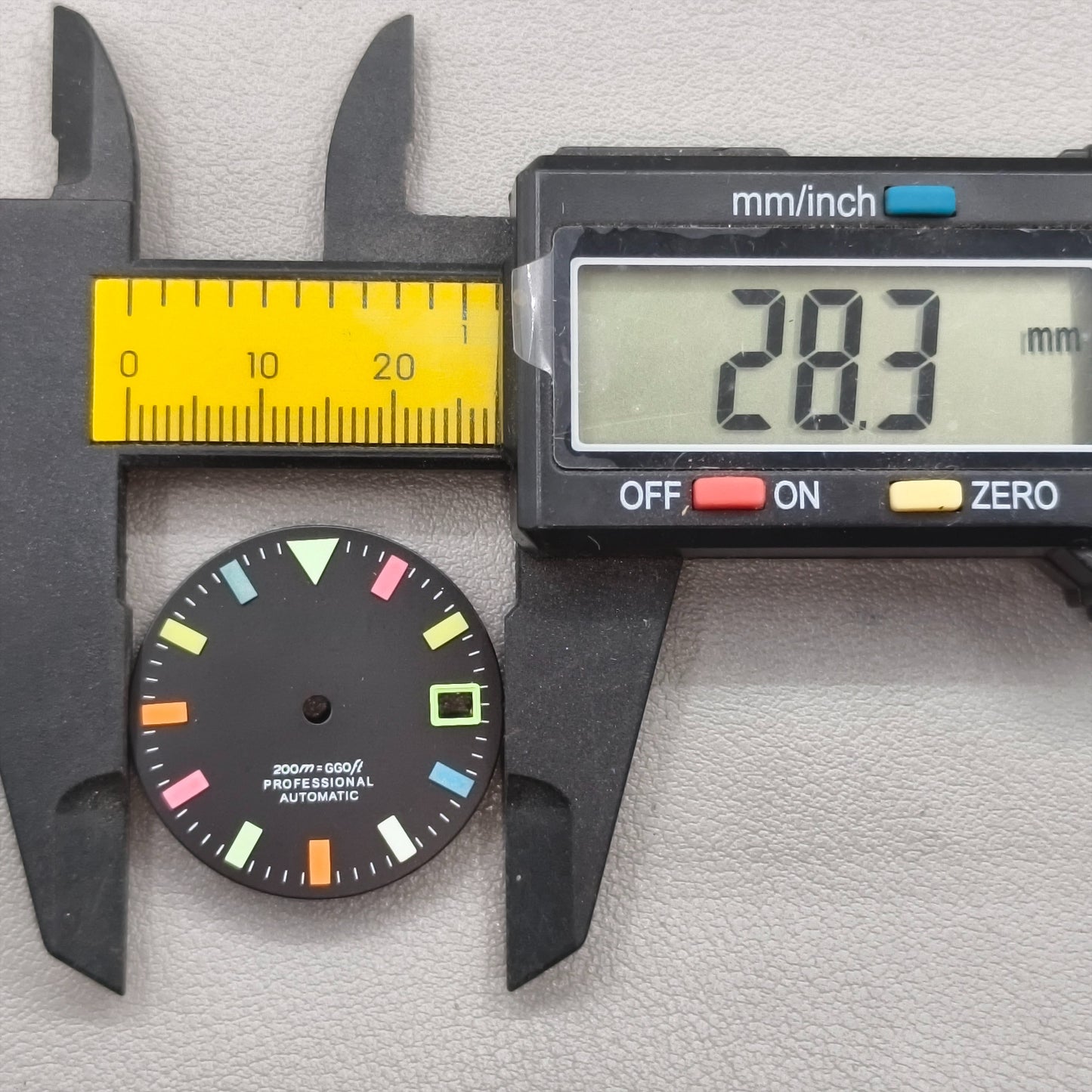 watch dial with S logo