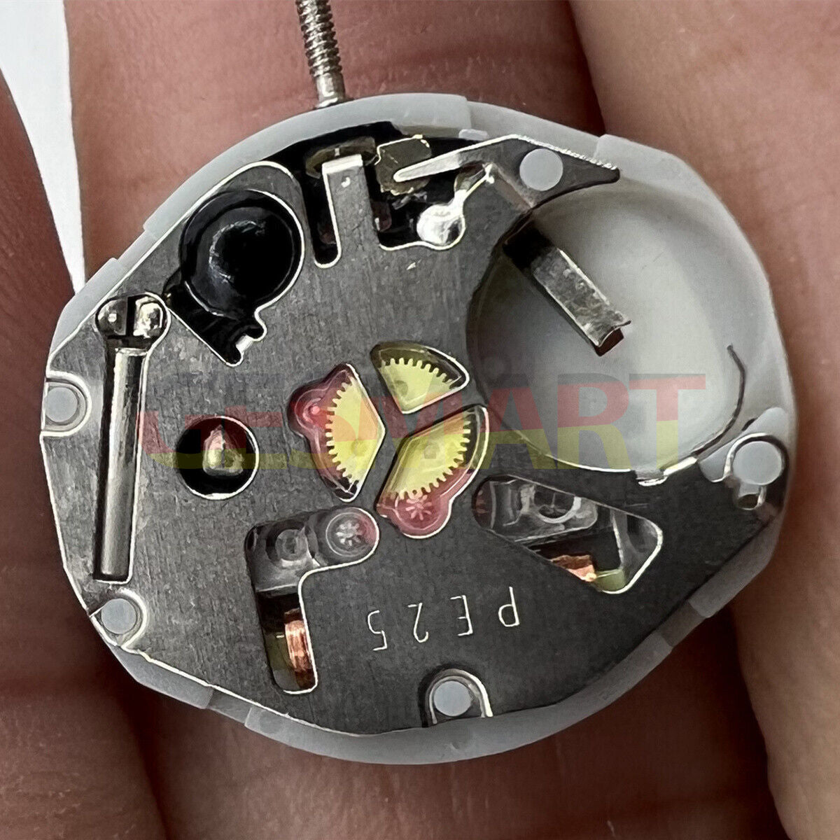Sunon PE25 quartz watch movement with 3 hands and date window at 3 and 6 o?clock, replacement part.
