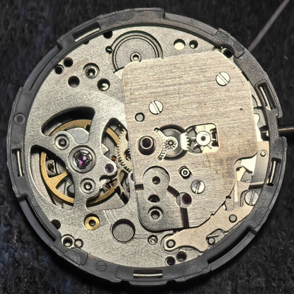 Japan Made YN77 mechanical watch movement, precise stock part for watch repairs and upgrades.