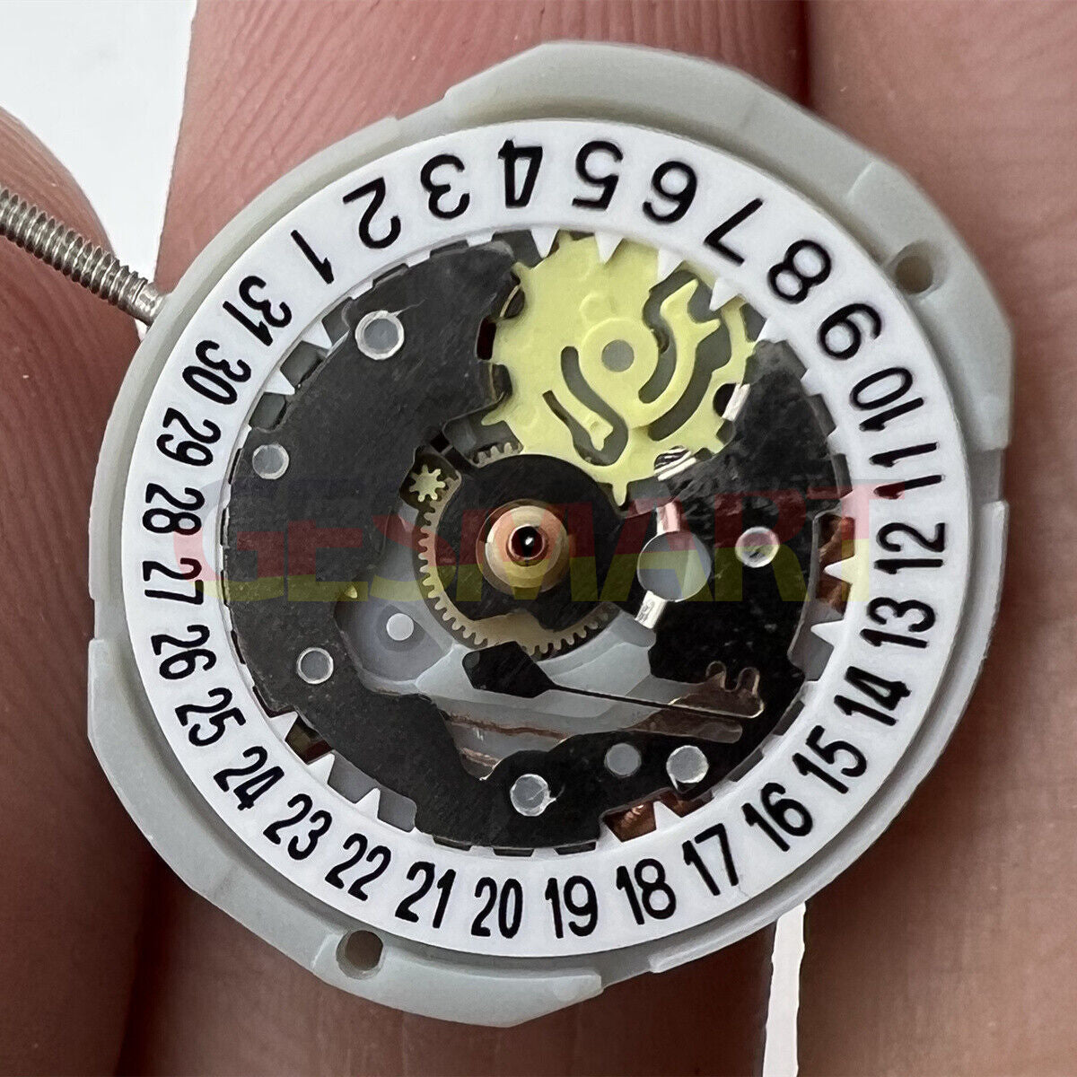 Sunon PE25 quartz watch movement with 3 hands and date window at 3 and 6 o?clock, replacement part.