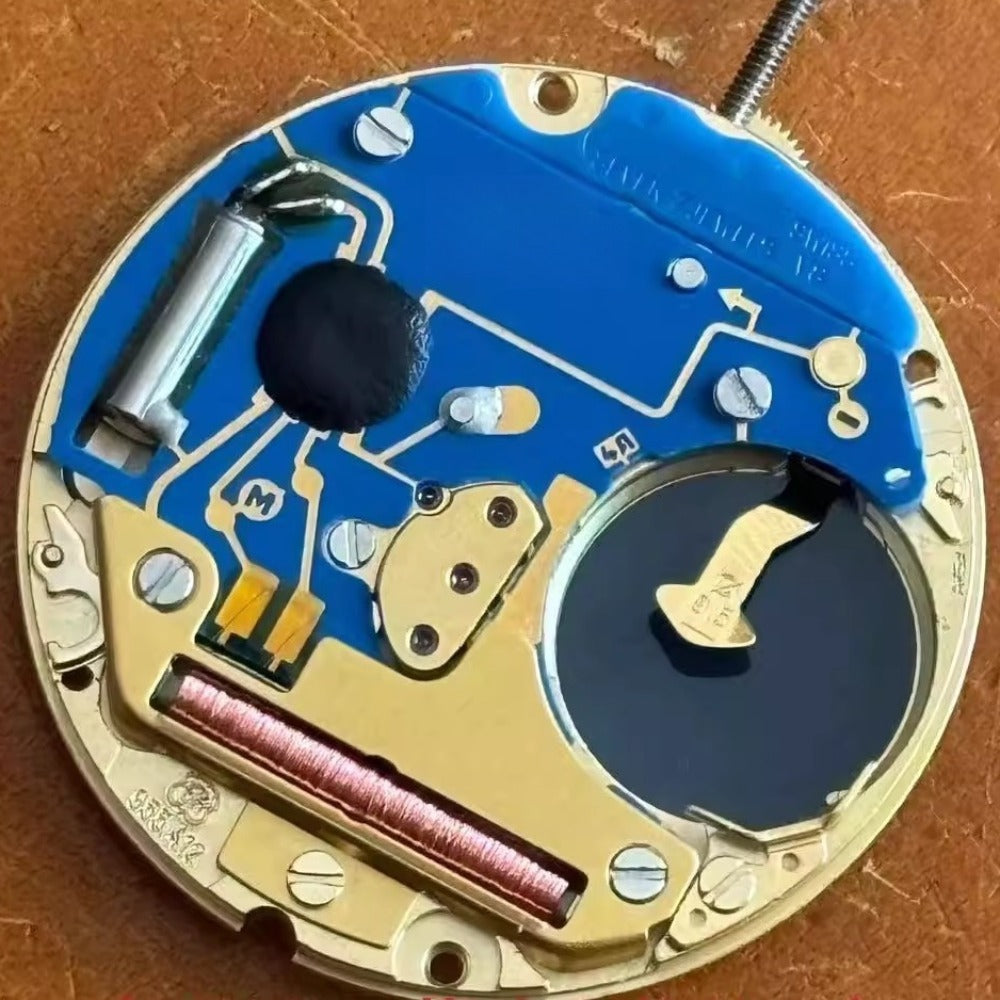 Swiss Made ETA955.412 quartz watch part with black disk date at 6, precise 3-hand movement by ETA