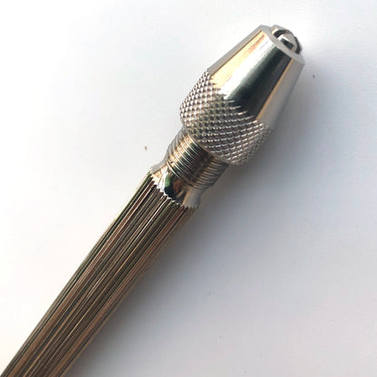 Bergeon 1842-17A pin vise holding small watch parts, dual chucks for 0-3mm precision tasks.