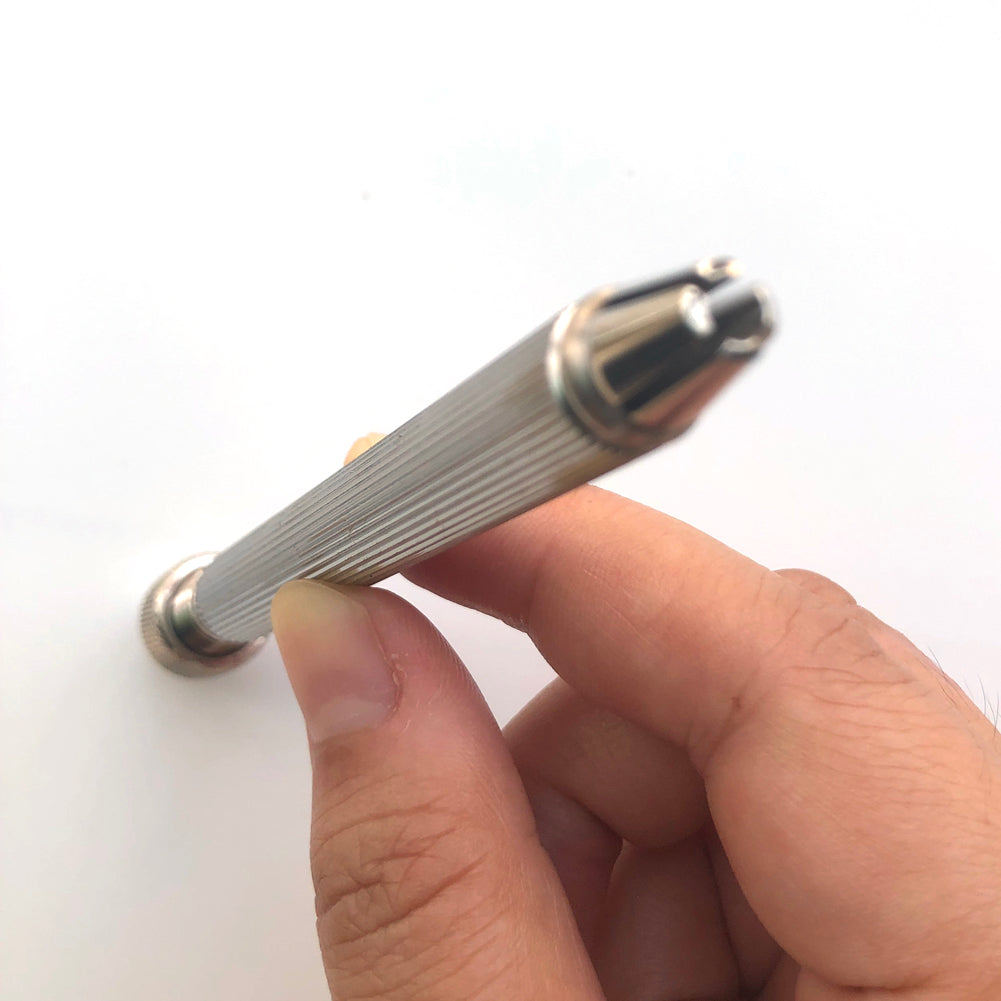 Bergeon 1842-17A pin vise securely holding precision watch parts, with dual 0-3mm chucks for detailed repairs