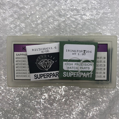 Set of 69 watch parts including sapphire crystals and I-Rings in various sizes for precise repairs.