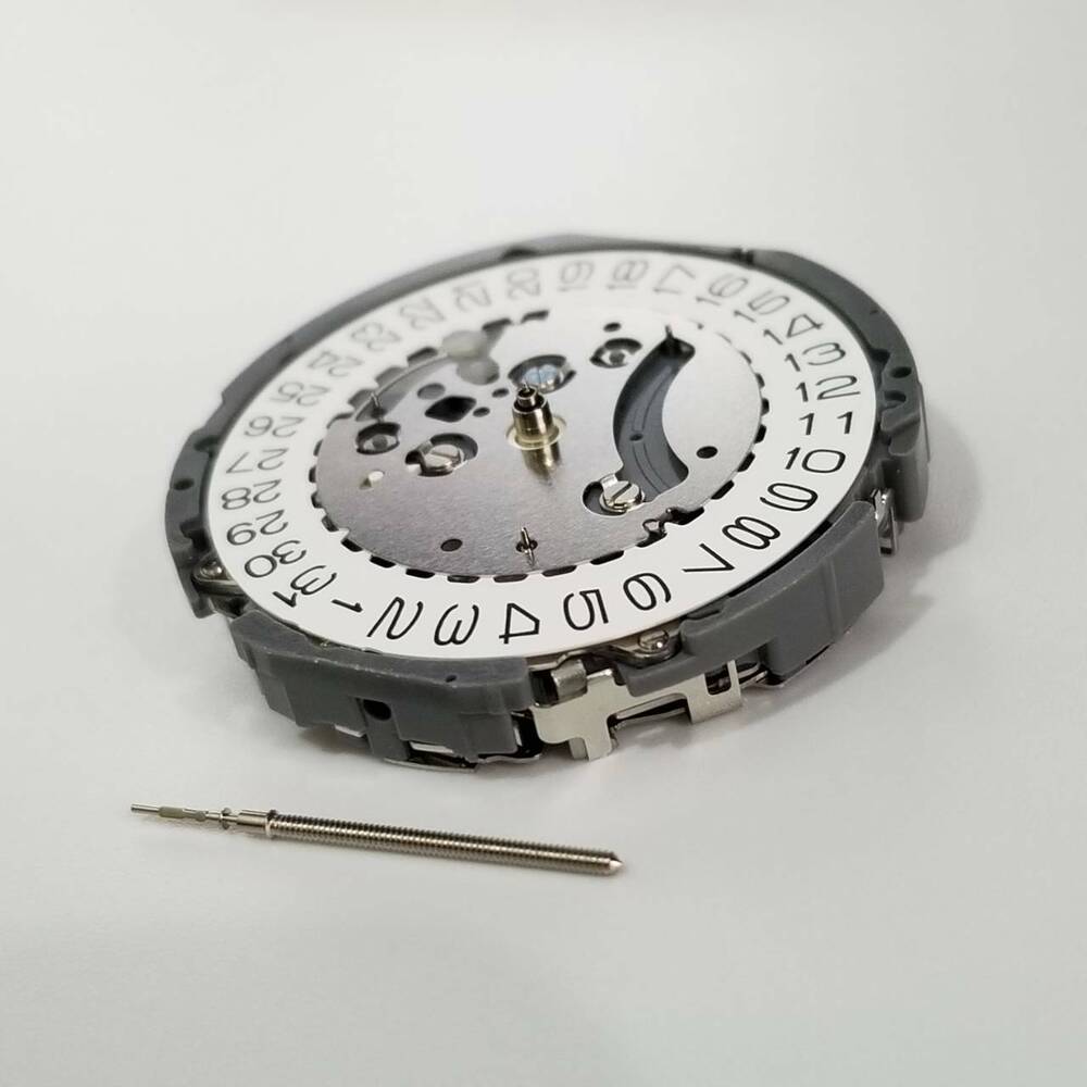 Hattori Epson TMI VK68 quartz movement watch repair part for precise timekeeping.  