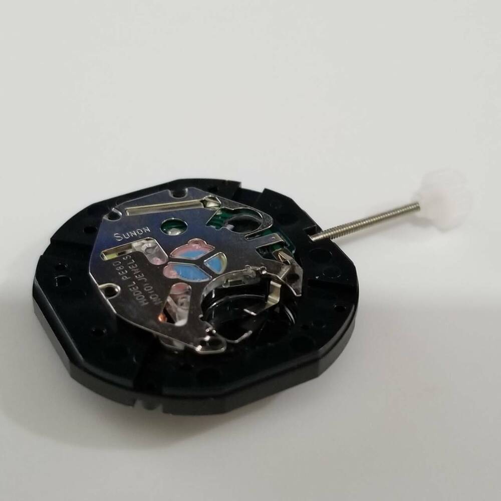 SUNON PE80-1 quartz watch movement, precise timekeeping part for watch repair projects.
