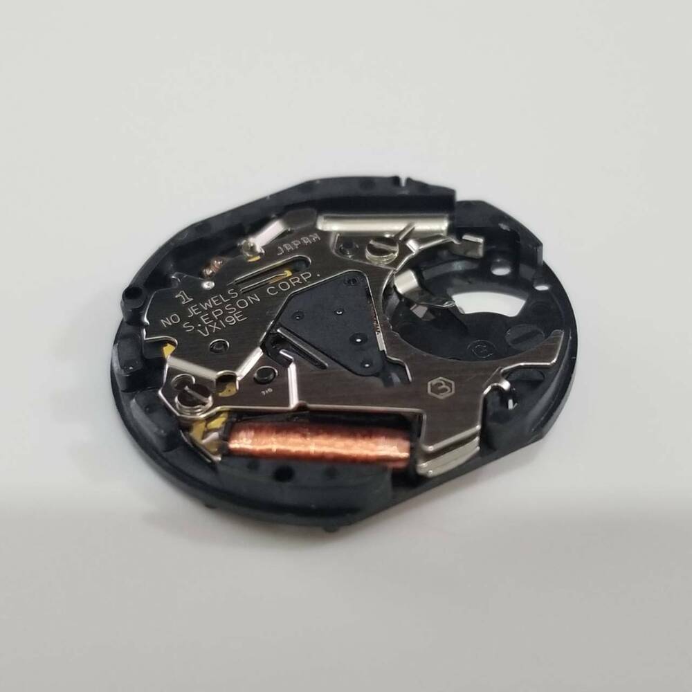 S. Epson VX19 quartz watch movement, precise repair part for accurate timekeeping in watch accessories.