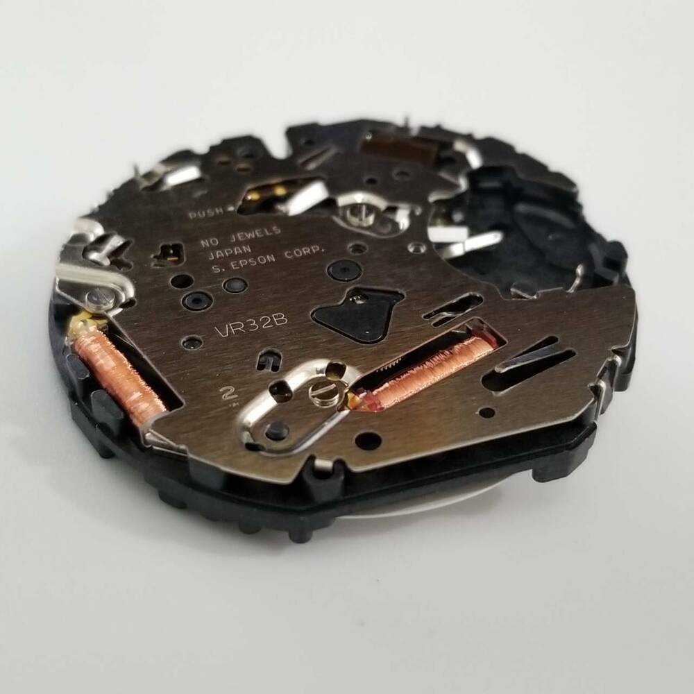 S. Epson VR32 quartz watch movement part for precise timekeeping in watch accessory repairs.