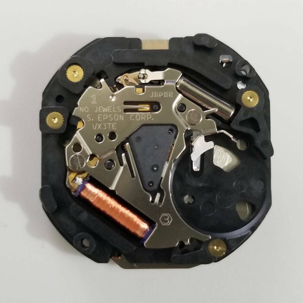 S. Epson VX3T quartz watch repair part showing precise movement components for accurate timekeeping.