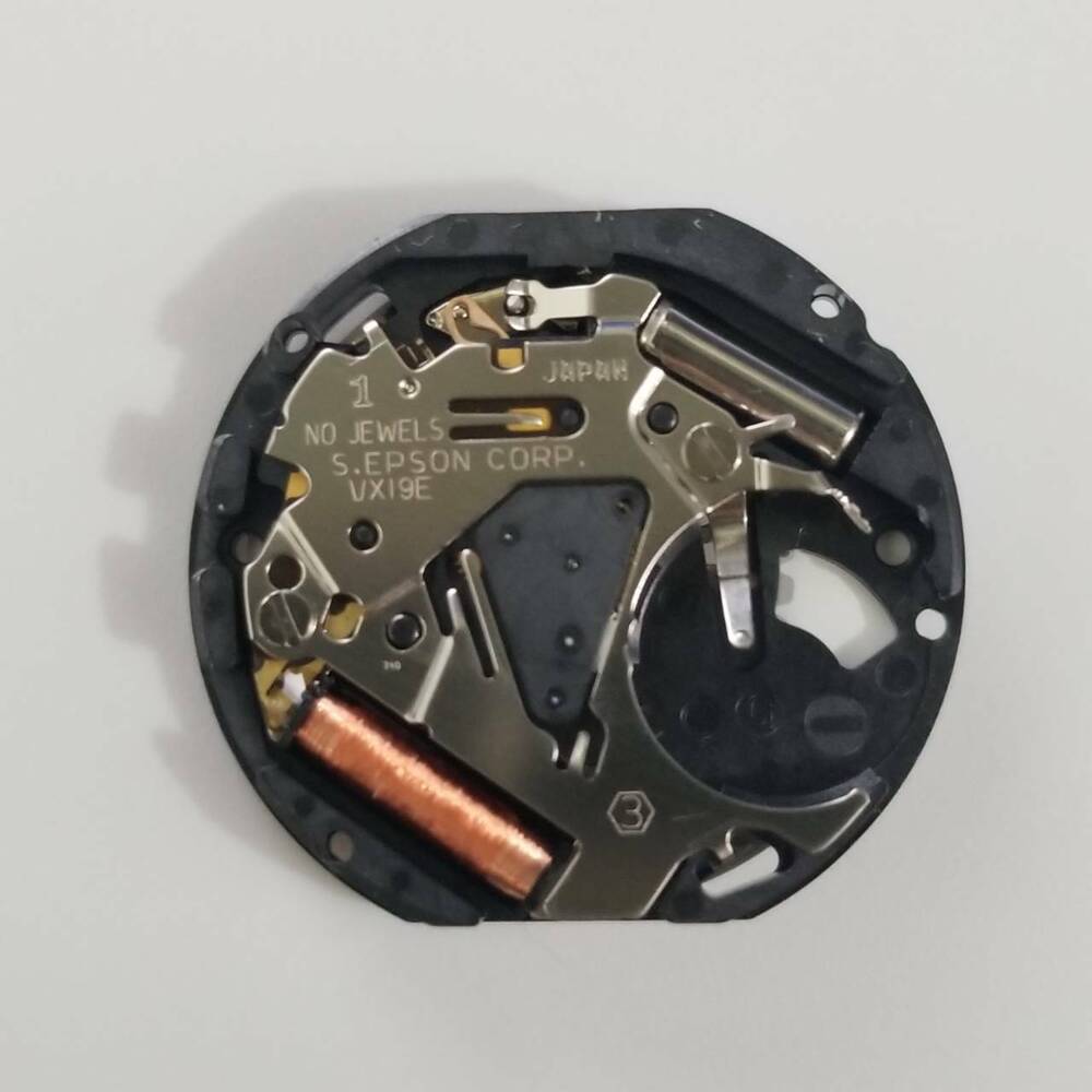 S. Epson VX19 quartz watch movement, precise repair part for accurate timekeeping in watch accessories.
