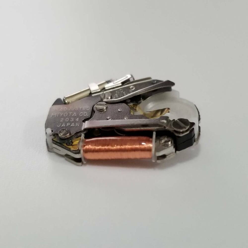 Miyota 2034 quartz movement replacement for accurate watch repairs and reliable timekeeping.