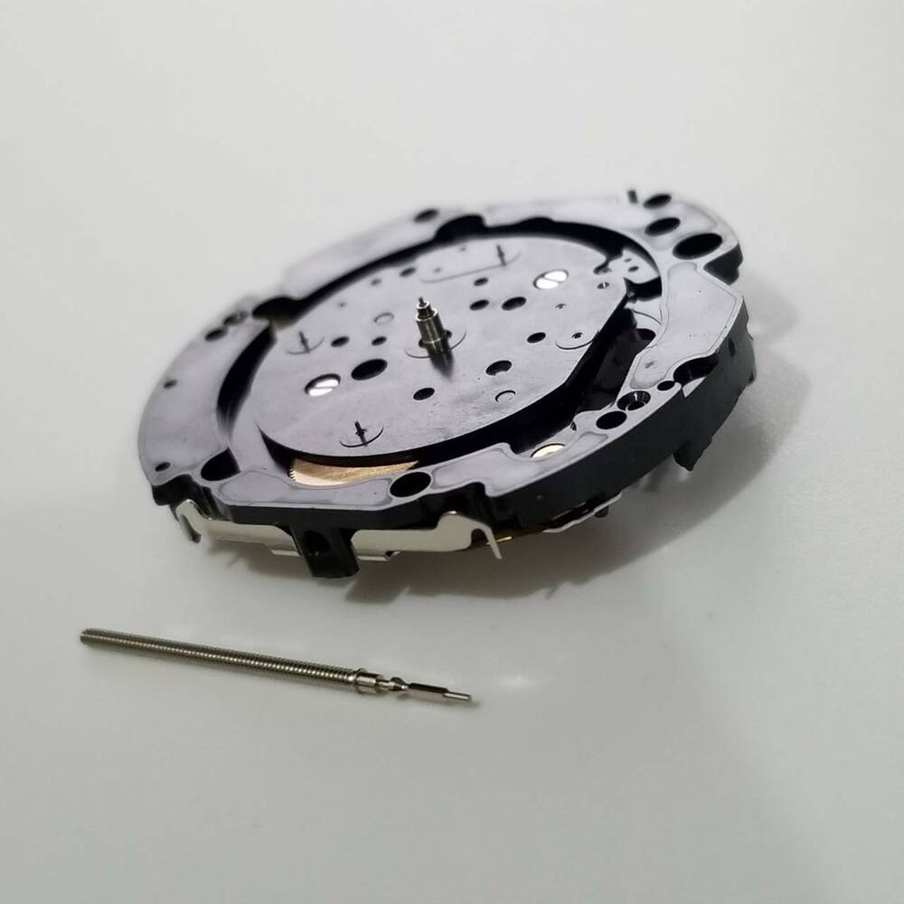 Hattori Epson TMI VD34A quartz watch movement, precision Japan-made component for repairs.