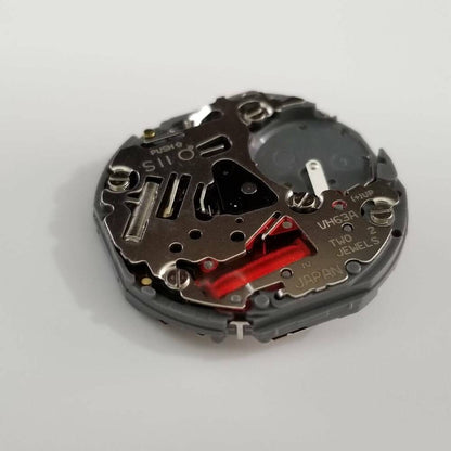 Hattori Epson VH63A quartz watch movement, precision Japanese repair part for accurate timekeeping.