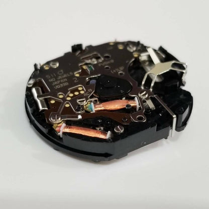 Hattori Epson VD33A quartz watch movement, Japan-made repair part for precise watch accessory maintenance.