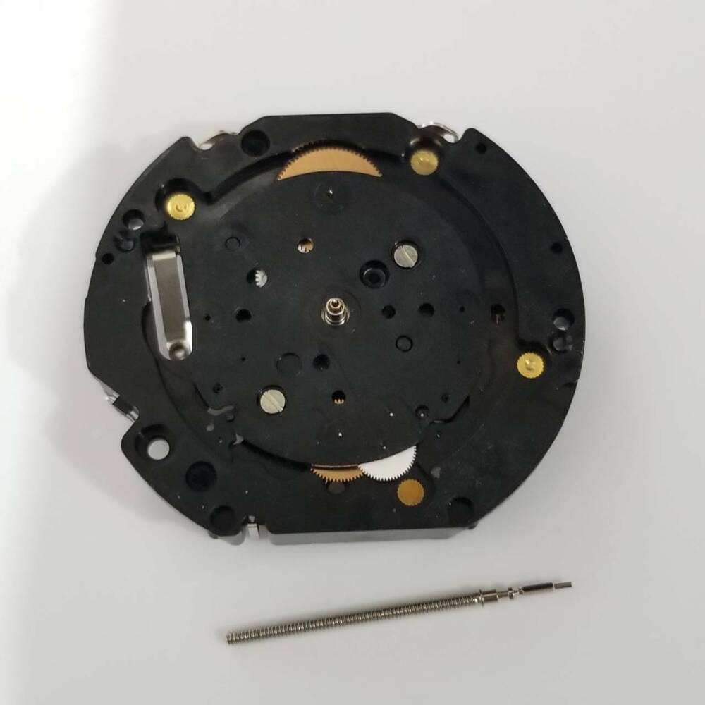 Hattori Epson VD32A quartz watch movement, precision Japanese repair part for timepieces.