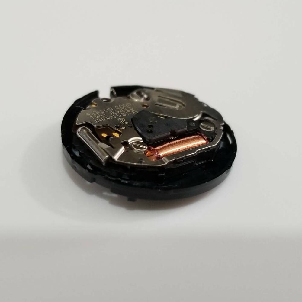 S. Epson VS17 solar quartz watch movement, reliable repair part for accurate timekeeping precision.