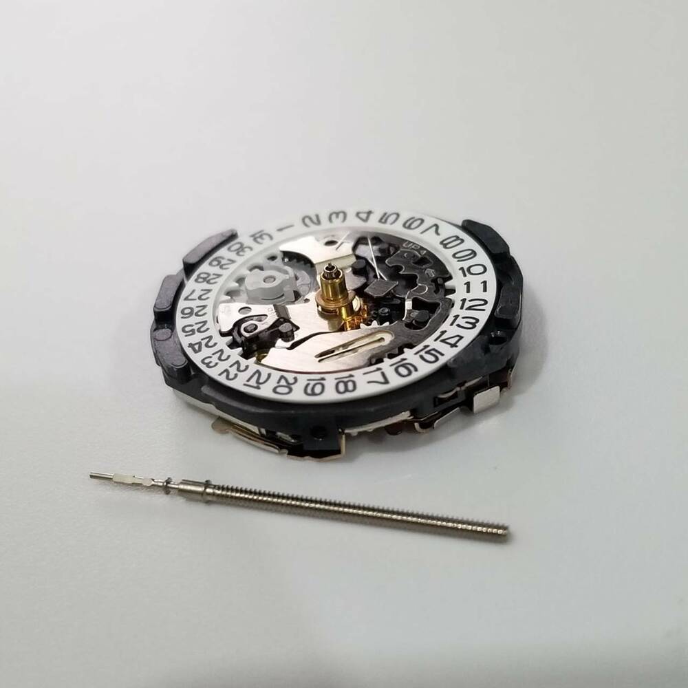 S. Epson AL82 quartz watch movement part for accurate timekeeping in watch repairs.