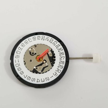 Close-up of ISA 2320 quartz movement watch repair parts for precise timepiece maintenance.