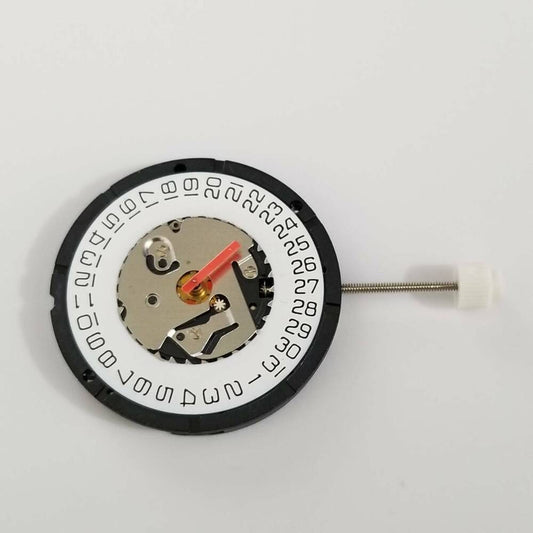 Close-up of ISA 2320 quartz movement watch repair parts for precise timepiece maintenance.
