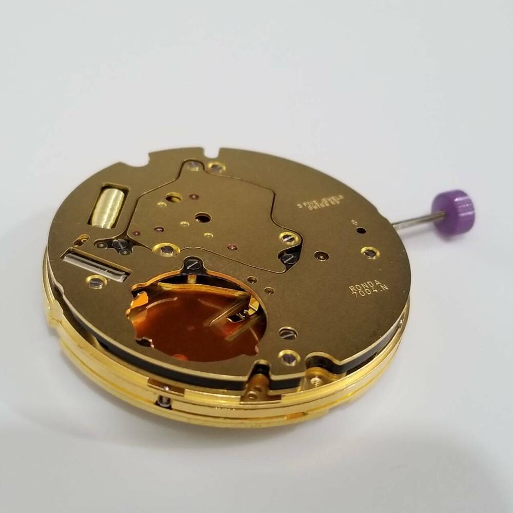 Ronda 7004.N quartz watch movement by Ronda for accurate watch repair and timekeeping.