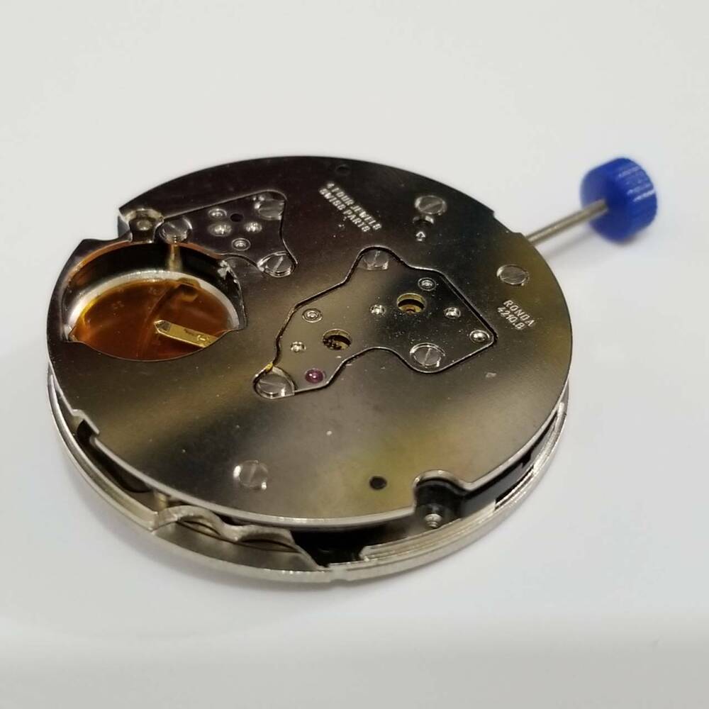 Ronda 4210.B quartz watch movement with silver plating, Swiss precision for big date repairs.