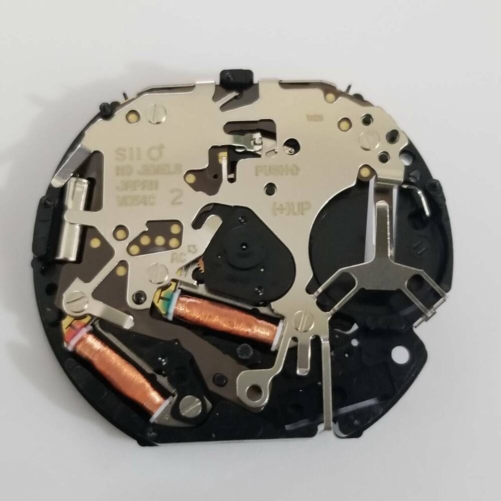 Hattori Epson TMI VD54 quartz watch movement for accurate watch repairs and replacements.