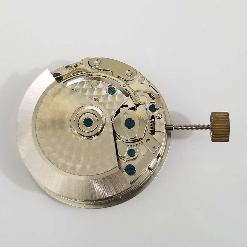 DANDONG 7750 automatic watch movement with white day-date display for precise repair tasks