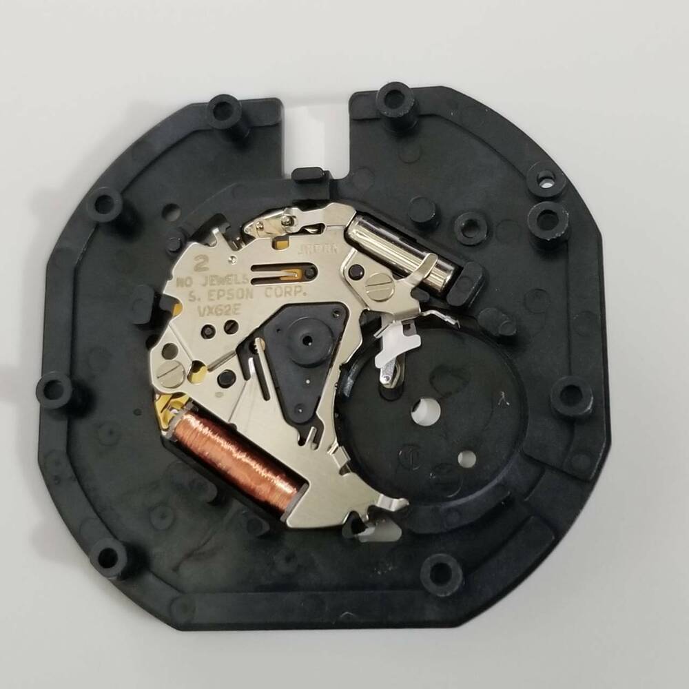 S. Epson VX62 quartz watch repair part with date display at 3 o'clock, precise timekeeping component.