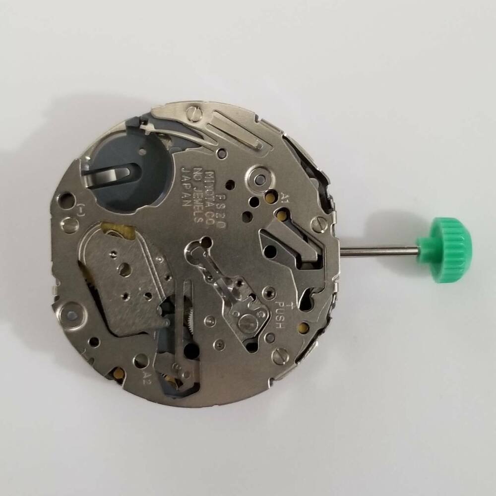 Miyota FS20 quartz watch movement, precise F520 replacement part for reliable repairs.