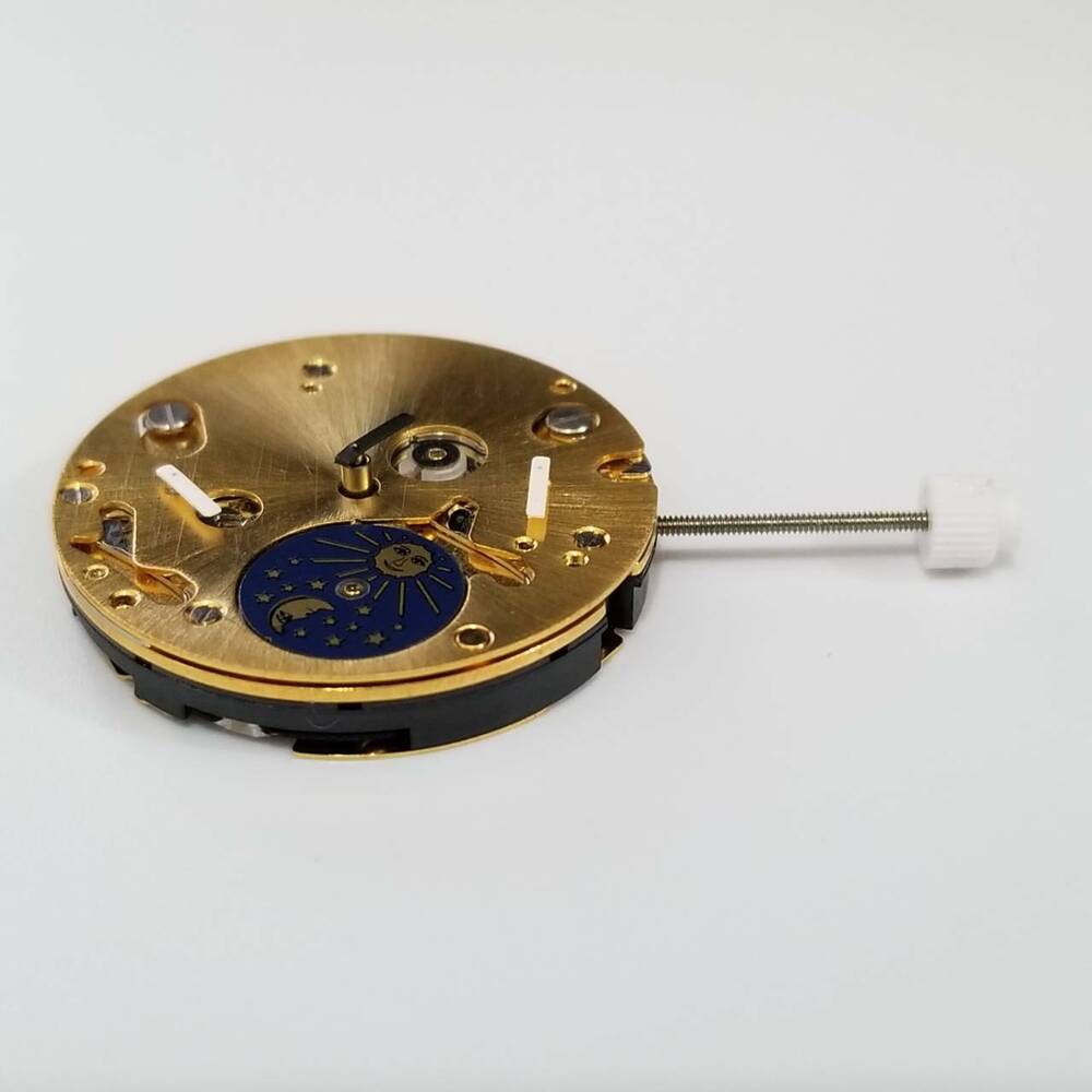 Gold quartz watch repair parts from ISA 9231, compatible with various watch models.