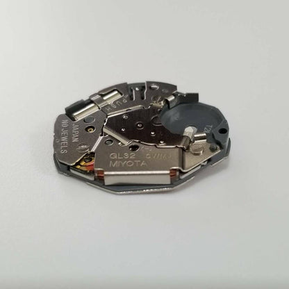 Miyota GL32 quartz watch movement, precise timekeeping replacement part for watch repairs.