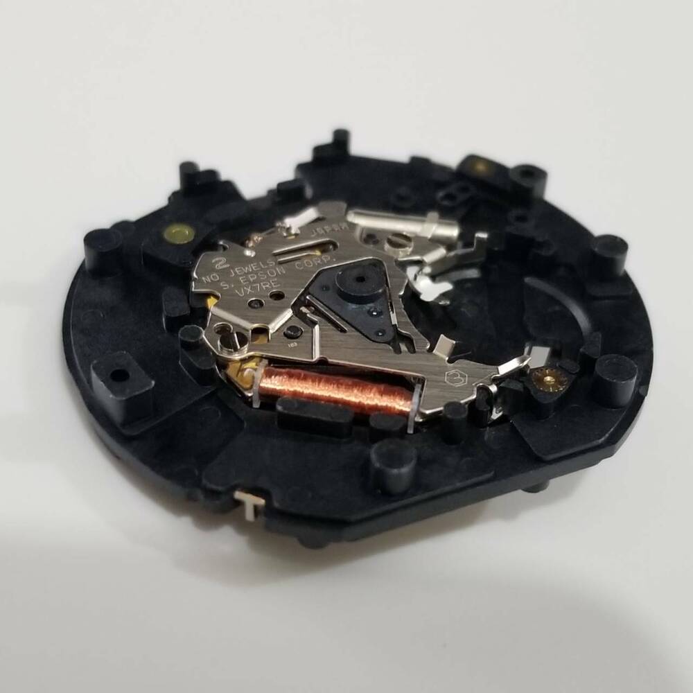 S. Epson VX7R quartz watch repair part displaying accurate movement components for precise timepiece restoration.