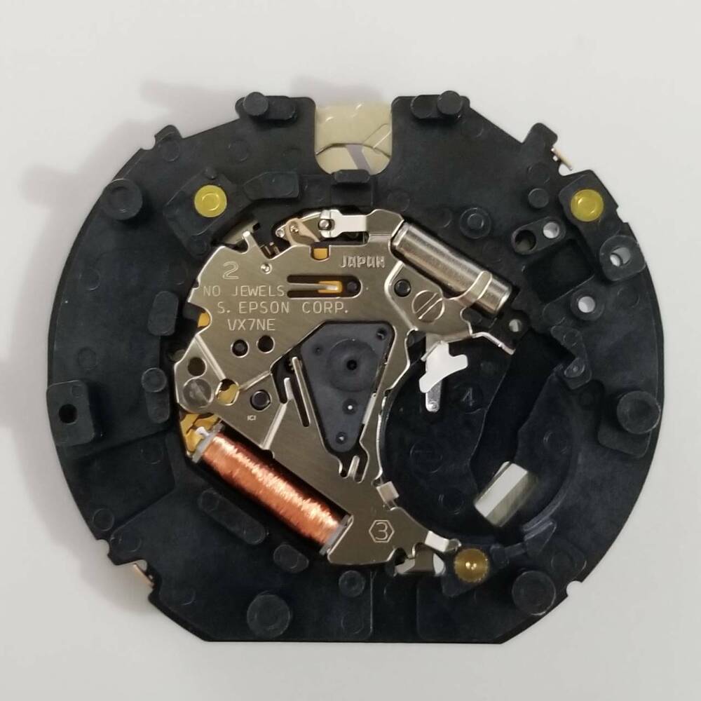 S. Epson VX7N quartz watch movement, precise replacement part for accurate timekeeping and repair.