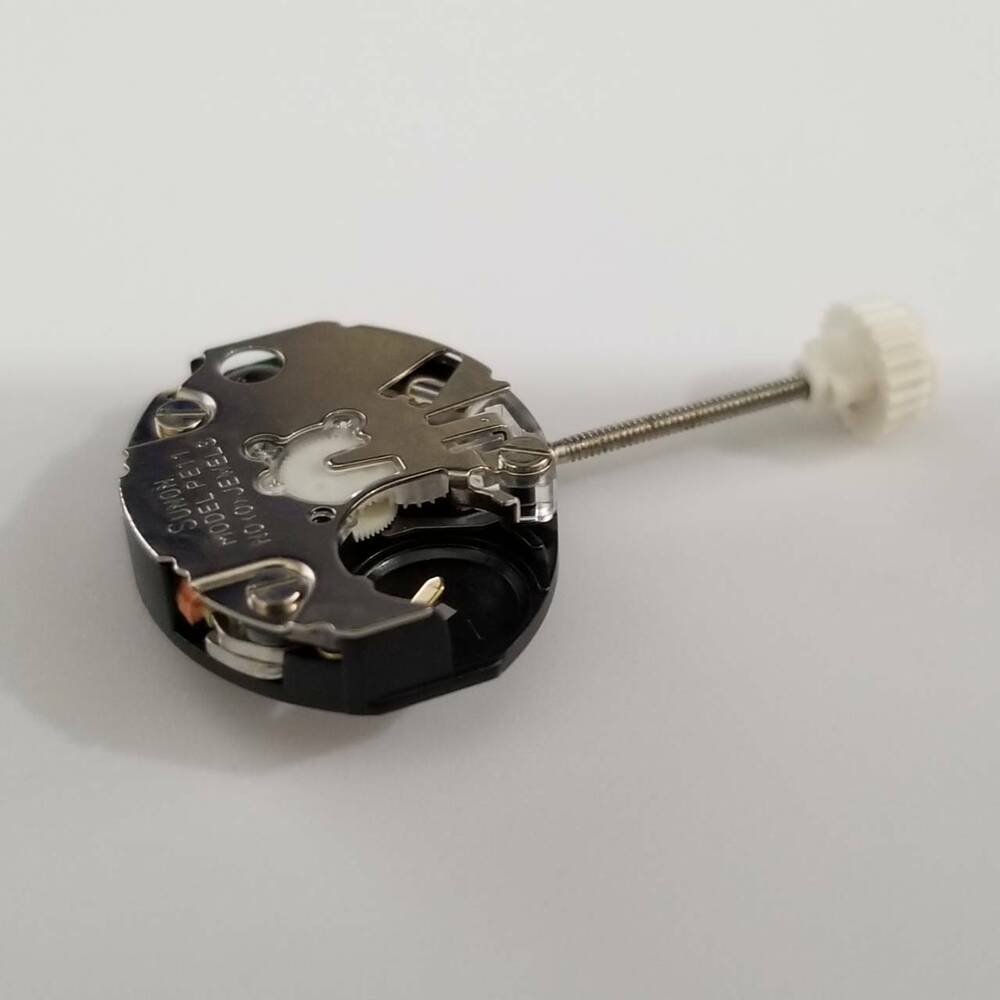 Set of 3 SUNON PE11 quartz watch movements for accurate repair and replacement in watch accessories.