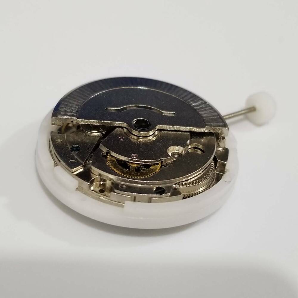 MINGZHU DG2813 automatic watch movement showing date and wide day display, precise 8205 replacement part.