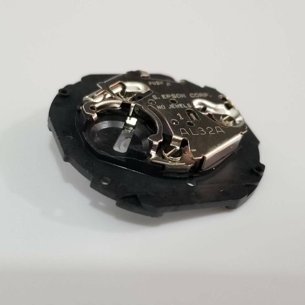S. Epson AL32 quartz movement for accurate watch repair and reliable replacement parts.