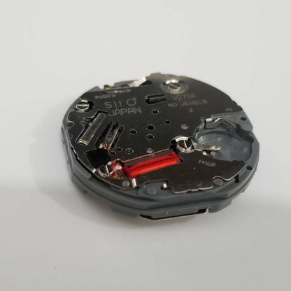 Hattori Epson VD75A quartz watch movement by TMI, precise Japan-made component for repair.