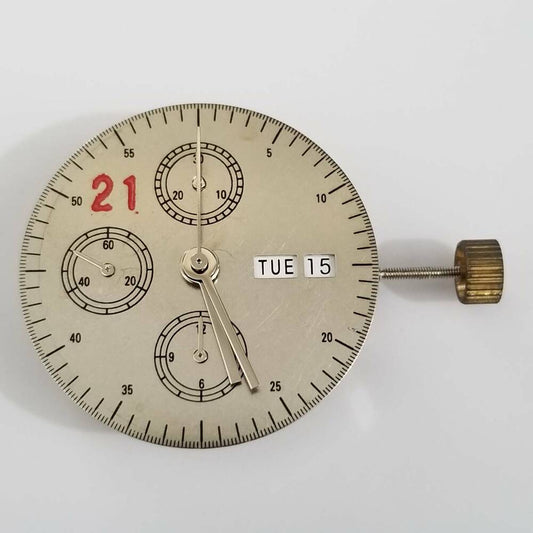 DANDONG 7750 mechanical automatic watch movement with white day and date display for repairs.