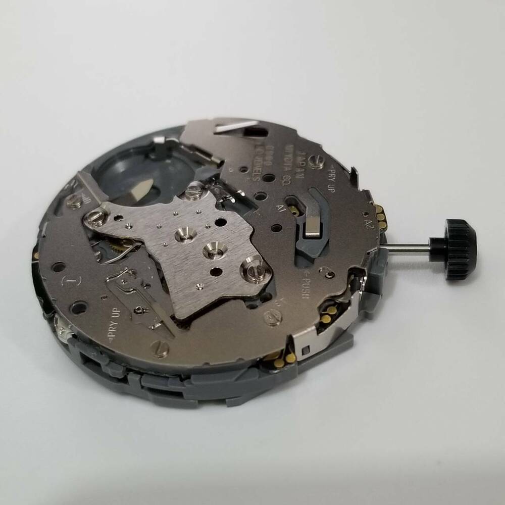 Miyota 0S80 quartz watch movement replacement part for precise timekeeping and watch repairs.
