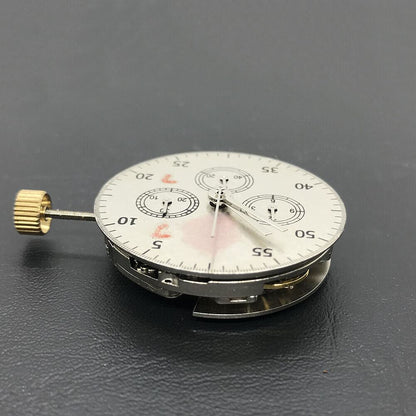 Close-up of Asian 7750 automatic chronograph movement displaying ETA 7753 layout at 3, 6, and 9 o?clock for watch repair.