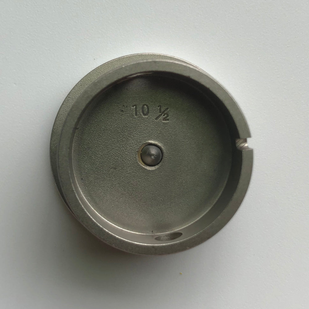 Bergeon 1997 DI 1012 watch movement holder with center screw for precise watch repair and maintenance.