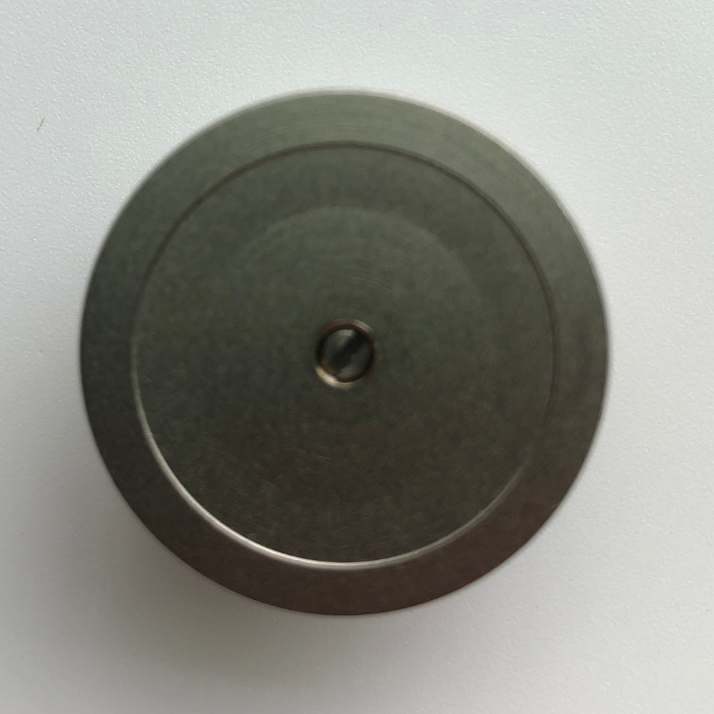 Bergeon 1997 DI 734 watch movement holder with center screw, ideal for securing 7-3/4 ligne movements during repairs.