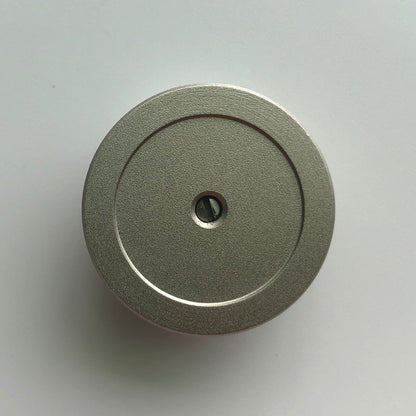 Bergeon 1997 DI 834 watch movement holder with center screw for precise 8-3/4 ligne watch repairs.
